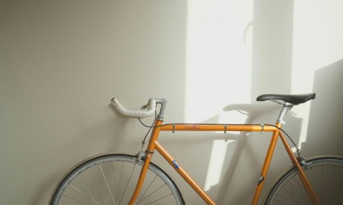 a bicycle parked in a room