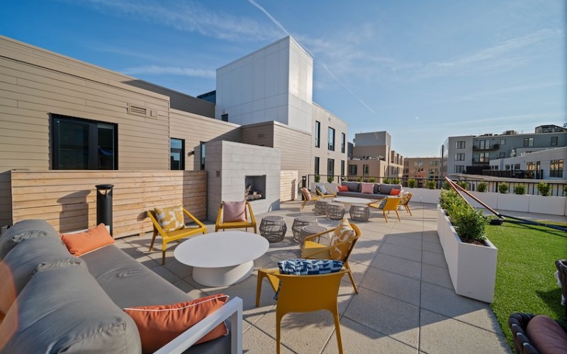 a skydeck over looking an outdoor sitting area