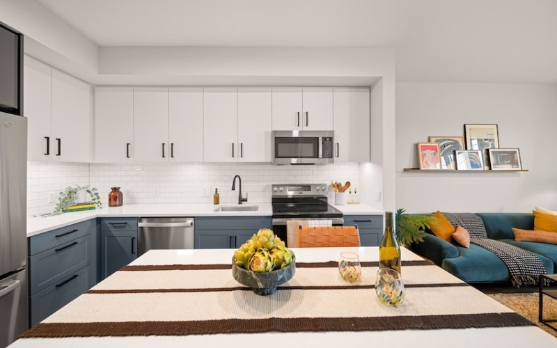 kitchen with white cabinets and island